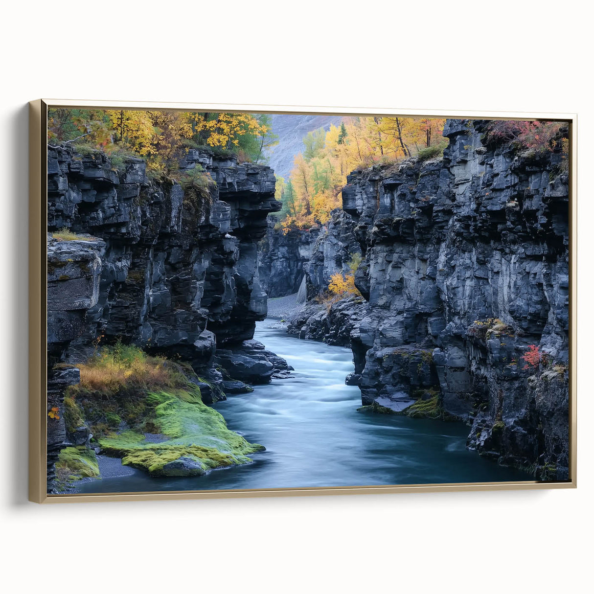 Framed canvas artwork depicting a stunning landscape of canyons, featuring rich earthy tones and a gold frame, ideal for modern home decor and art enthusiasts.