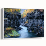 Framed canvas artwork showcasing a stunning landscape of canyons, featuring rich earth tones and intricate details, ideal for enhancing home decor.