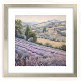 Silver-framed landscape wall art depicting a serene countryside scene, featuring lush greenery and a tranquil sky, perfect for home decor enhancement.