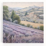 Stretched canvas wall art depicting a serene countryside landscape with lush green fields, rolling hills, and a vibrant blue sky, ideal for home decor.