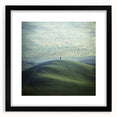 Black-framed landscape artwork featuring serene countryside scenery, presented with a white mat for an elegant finish, ideal for home decor.