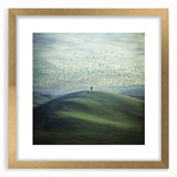 Elegant gold-framed landscape artwork showcasing a picturesque countryside scene, complete with a stylish mat, ideal for home decor or gallery display.