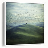 Framed canvas artwork showcasing a serene countryside landscape with rolling hills, lush greenery, and a clear blue sky, presented in a stylish white frame. Perfect for home decor enthusiasts seeking nature-inspired art.