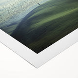 Rolled canvas artwork showcasing a serene countryside landscape, with vibrant greens and soft blues, elegantly packaged in a protective cardboard tube. Ideal for home decor enthusiasts seeking nature-inspired art.