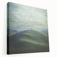 Stretched canvas artwork depicting a serene countryside landscape with rolling hills and a vibrant sunset, showcasing warm colors and natural beauty. Ideal for home decor.