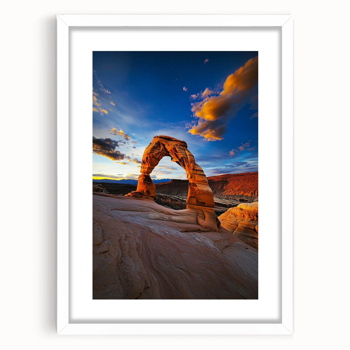 Framed desert landscape artwork in a sleek white mat, showcasing warm tones of sandy dunes and a vibrant sunset, perfect for home decor and interior design.