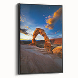Framed canvas artwork depicting a serene desert landscape with vibrant orange and yellow hues, showcasing a black frame from the side for a modern aesthetic.