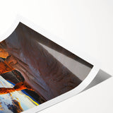 Desert landscape rolled print showcasing vibrant colors of orange and yellow dunes under a bright blue sky, elegantly packaged in a protective cardboard tube.