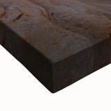 Close-up of a stretched canvas depicting a vibrant desert landscape with warm hues of orange and yellow, showcasing intricate details of dunes and sky, ideal for home decor.