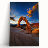 Desert landscape stretched canvas art featuring vibrant hues of orange and yellow, leaning against a neutral wall, perfect for modern home decor.