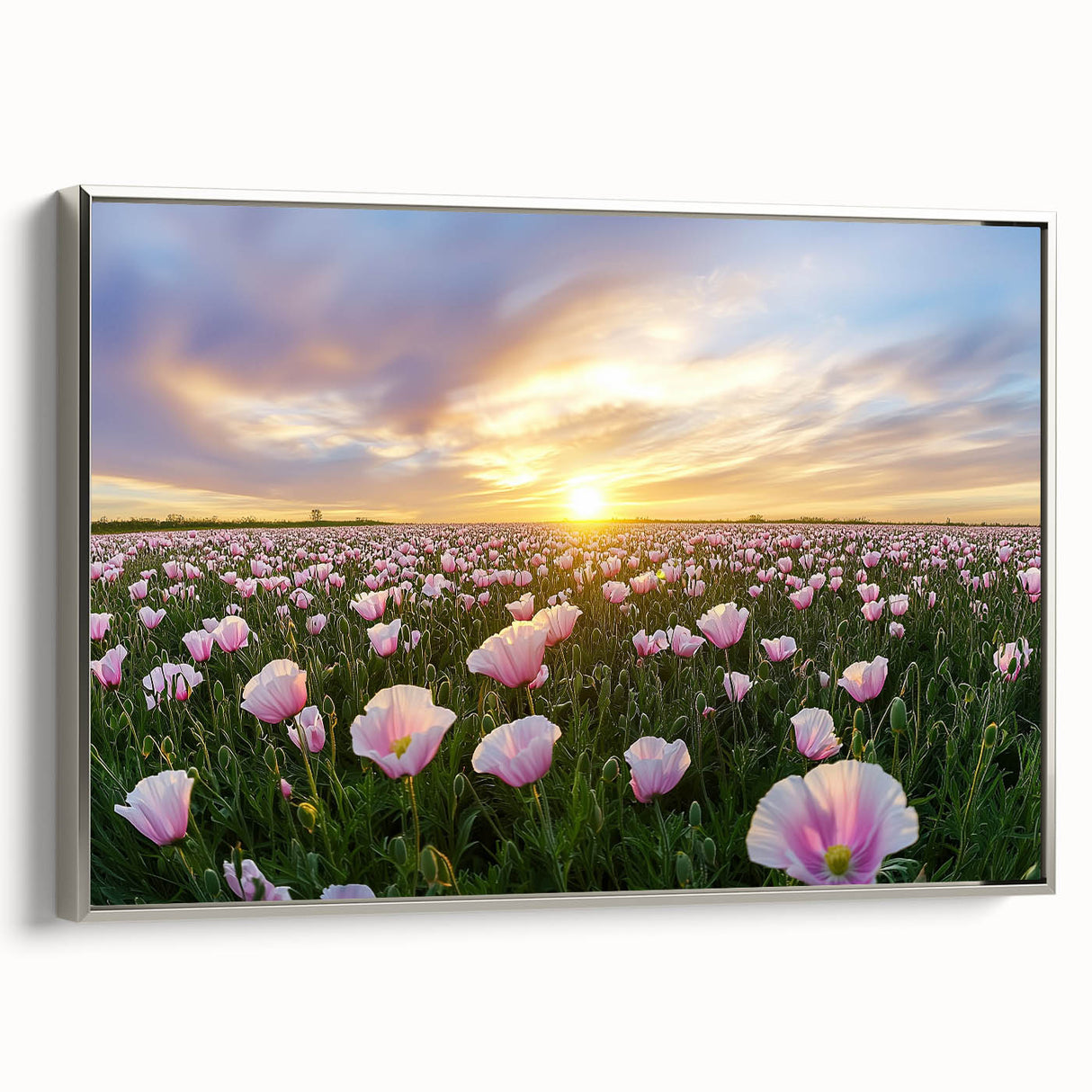 Framed canvas artwork depicting a serene landscape with fields and rolling hills, featuring a silver frame that enhances the visual appeal and complements modern decor.