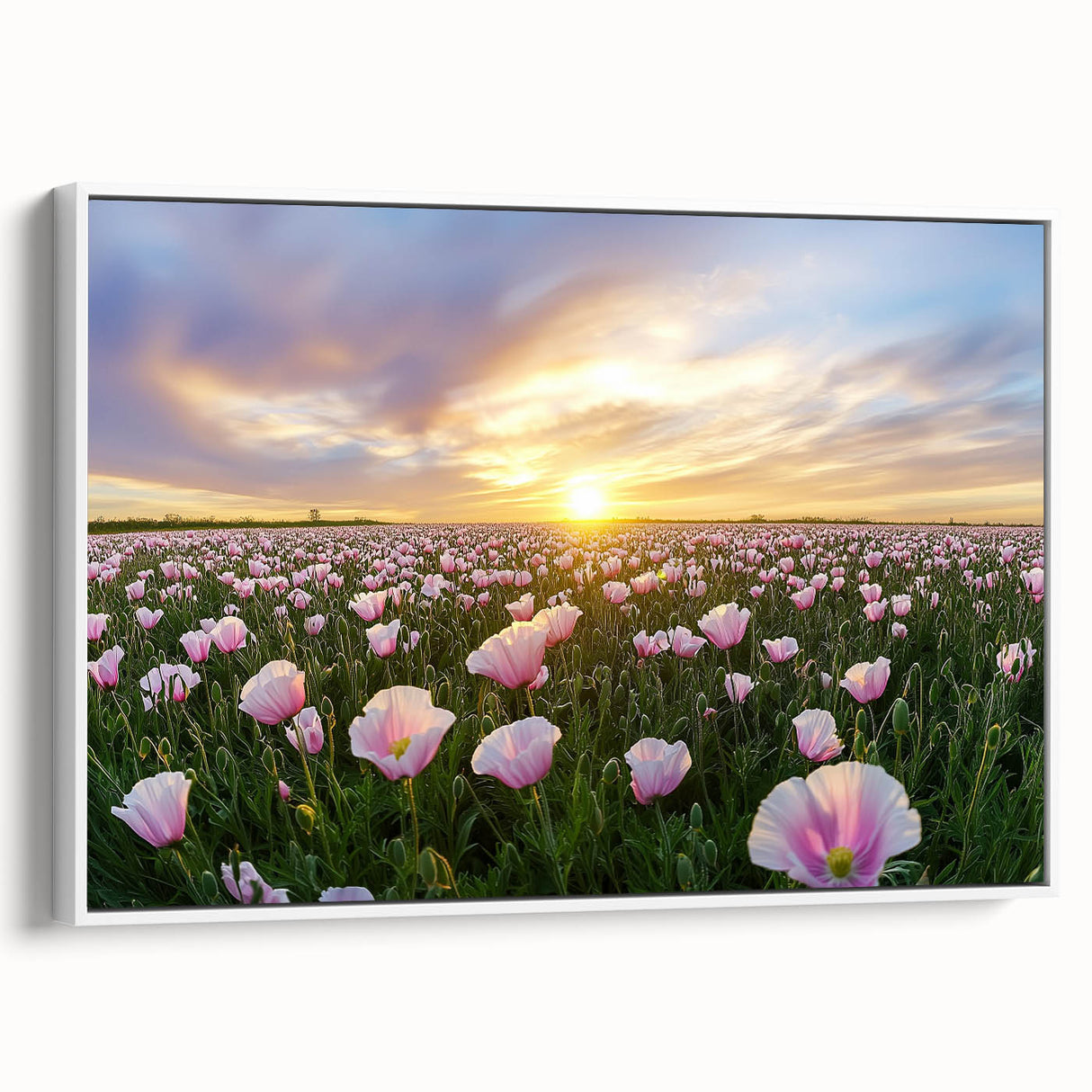 Framed canvas artwork showcasing a serene landscape with lush green fields and a clear blue sky, presented in a sleek white frame for an elegant home decor accent.