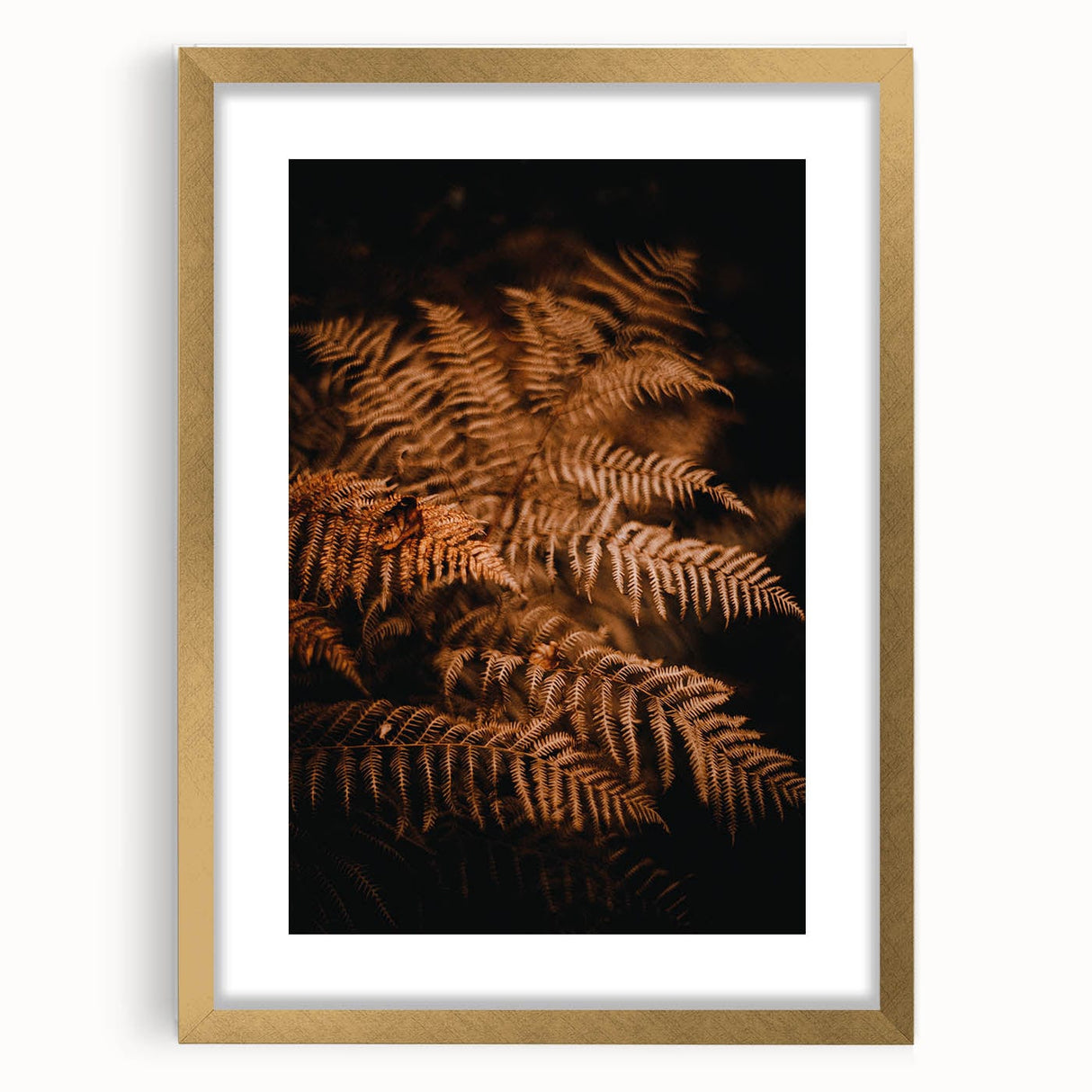 Extra large abstract art print depicting autumnal colors in a textured style, framed in gold, ideal for living room decor.