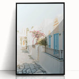 Large abstract wall art on acrylic, featuring bold blue and orange swirls, framed in black.