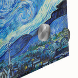 Large abstract wall art print on acrylic glass featuring swirling shades of blue and yellow, ideal for dining room ambiance.