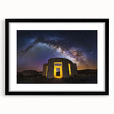 Elegant black-framed landscape artwork showcasing a majestic castle surrounded by lush greenery, designed with a mat for added sophistication, perfect for home decor.