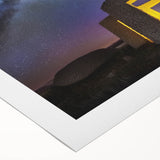 Rolled canvas artwork depicting a scenic landscape with a majestic castle and vibrant foliage, elegantly packaged in a durable tube for safe transport.