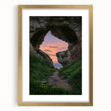 Elegant gold-framed landscape artwork featuring a serene cave scene with intricate details, set against a soft mat background, ideal for home decor enhancement.