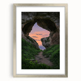 Framed landscape artwork showcasing a serene cave scene with a silver mat, ideal for home decor, enhancing modern interiors with natural beauty.