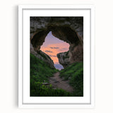 Framed landscape art print featuring a serene cave scene, set against a white mat and elegant frame, perfect for home decor and interior design enhancement.