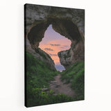 Stretched canvas artwork depicting a serene landscape with intricate cave formations and vibrant colors, perfect for enhancing modern home decor.