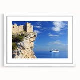 Elegant white-framed landscape artwork showcasing dramatic cliffs against a serene sky, perfect for modern home decor. The piece is presented with a crisp mat, enhancing its visual appeal.