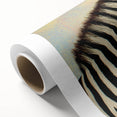 Rolled canvas showcasing vibrant animal-themed wall art design, featuring intricate details and bold colors, packaged securely in a durable cardboard tube for safe transportation. Perfect for adding a unique touch to home decor or art collections.