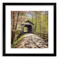 Extra large abstract art print of a colorful, textured covered bridge on a black framed canvas.