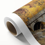 Rolled canvas showcasing a vibrant landscape bridge design with rich colors and intricate details, packaged securely in a durable cardboard tube for safe shipping.
