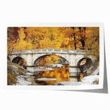 Landscape bridge rolled canvas print showcasing a serene river scene with lush greenery and a wooden bridge, rolled for safe shipping in a protective tube.