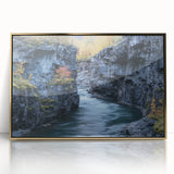 Framed acrylic artwork titled "Canyons" featuring vibrant landscapes in gold tones, showcasing intricate details of canyon formations, perfect for home decor.