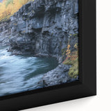 Close-up of a framed landscape canvas featuring vibrant canyons in rich earthy tones, highlighting the intricate textures and details of the artwork, perfect for home decor.