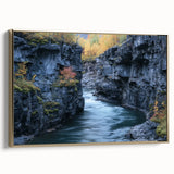 Framed canvas artwork depicting a stunning landscape of canyons, showcasing rich earthy tones and intricate details, with a luxurious gold frame enhancing its elegance. Ideal for home decor, this piece adds a touch of nature-inspired beauty to any space.