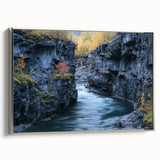 Framed canvas featuring a stunning landscape of canyons in rich earthy tones, elegantly displayed with a silver frame, perfect for enhancing modern home decor.