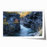 Landscape print showcasing vibrant canyons with rich earth tones and dramatic rock formations, rolled for easy shipping in a protective cardboard tube. Perfect for adding a natural touch to home decor.