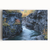 Stretched canvas artwork depicting a vibrant landscape of canyons at sunset, showcasing rich hues of orange, pink, and purple, perfect for home decor.