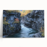 Stretched canvas artwork depicting a breathtaking landscape of canyons under a vibrant sunset, showcasing rich colors and dramatic textures, perfect for home decor.