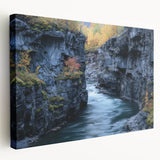 Stretched canvas artwork showcasing a vibrant landscape of canyons in warm earth tones, designed to enhance home decor with a natural, serene aesthetic.