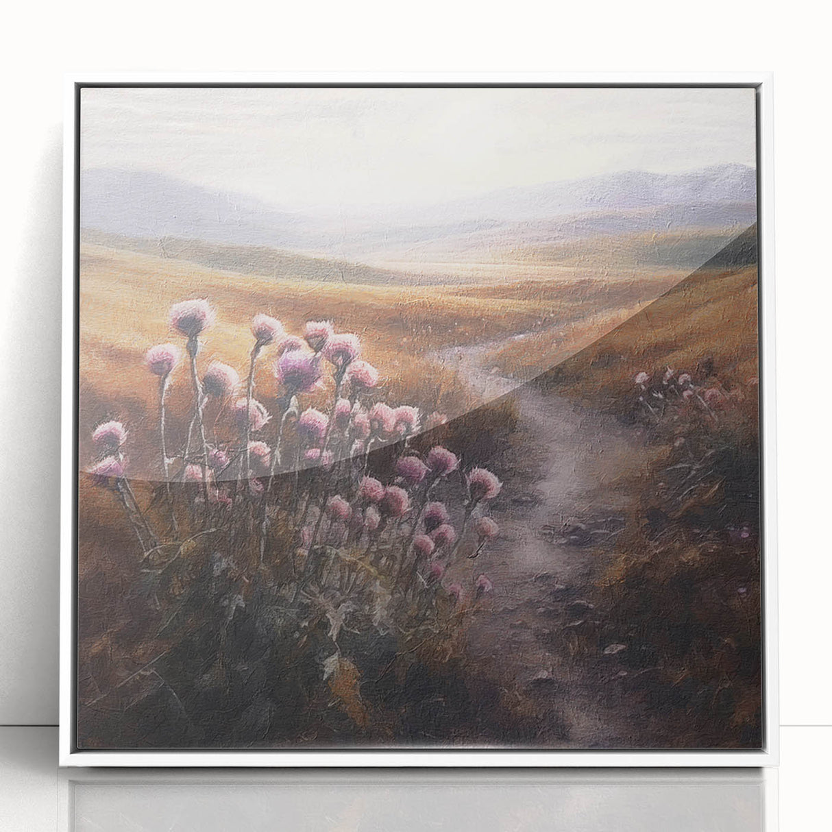 Framed acrylic wall art depicting a serene countryside landscape with lush green fields and a clear blue sky, showcased in a sleek white frame, perfect for home decor.