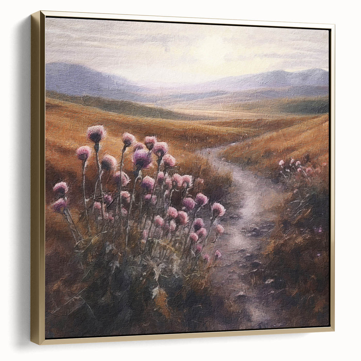 Framed landscape wall art depicting a serene countryside scene with lush green fields and a golden sunset, featuring a silver and gold frame for an elegant finish.
