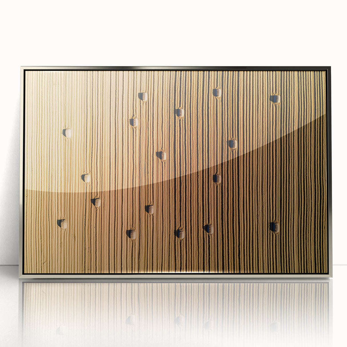 Framed acrylic artwork showcasing a serene countryside landscape with vibrant greens and soft blues, elegantly displayed in a sleek silver frame, perfect for home decor.