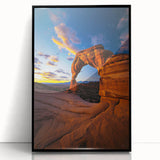 Framed acrylic artwork showcasing a vibrant desert landscape with warm tones of orange and yellow, featuring a sleek black frame, ideal for home decor.