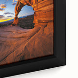Close-up view of a desert landscape framed canvas, showcasing vibrant colors and intricate details of the sandy terrain and blue sky, ideal for home decor.