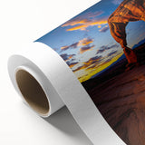 Desert landscape printed on rolled canvas, showcasing vibrant hues of orange and yellow, ideal for home decor. Packaged securely in a protective tube for shipping.