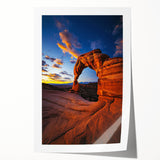 Stunning desert landscape rolled canvas print showcasing vibrant hues of orange and yellow against a serene blue sky, elegantly packaged in a protective tube.