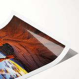 Desert landscape rolled canvas print showcasing vibrant orange and yellow hues, depicting a serene sunset over sand dunes, packaged securely in a protective tube.