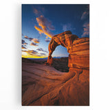 Vibrant stretched canvas artwork depicting a serene desert landscape, showcasing warm hues of orange and yellow under a bright blue sky, perfect for home decor.