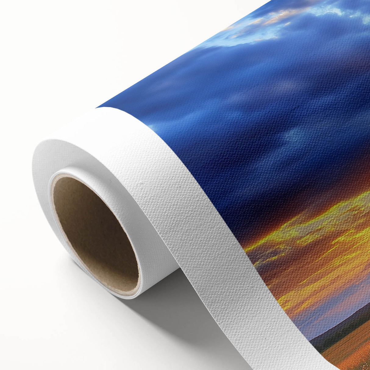 Vibrant rolled canvas print showcasing a scenic landscape of golden fields under a clear blue sky, elegantly packaged in a protective cardboard tube for easy transport.