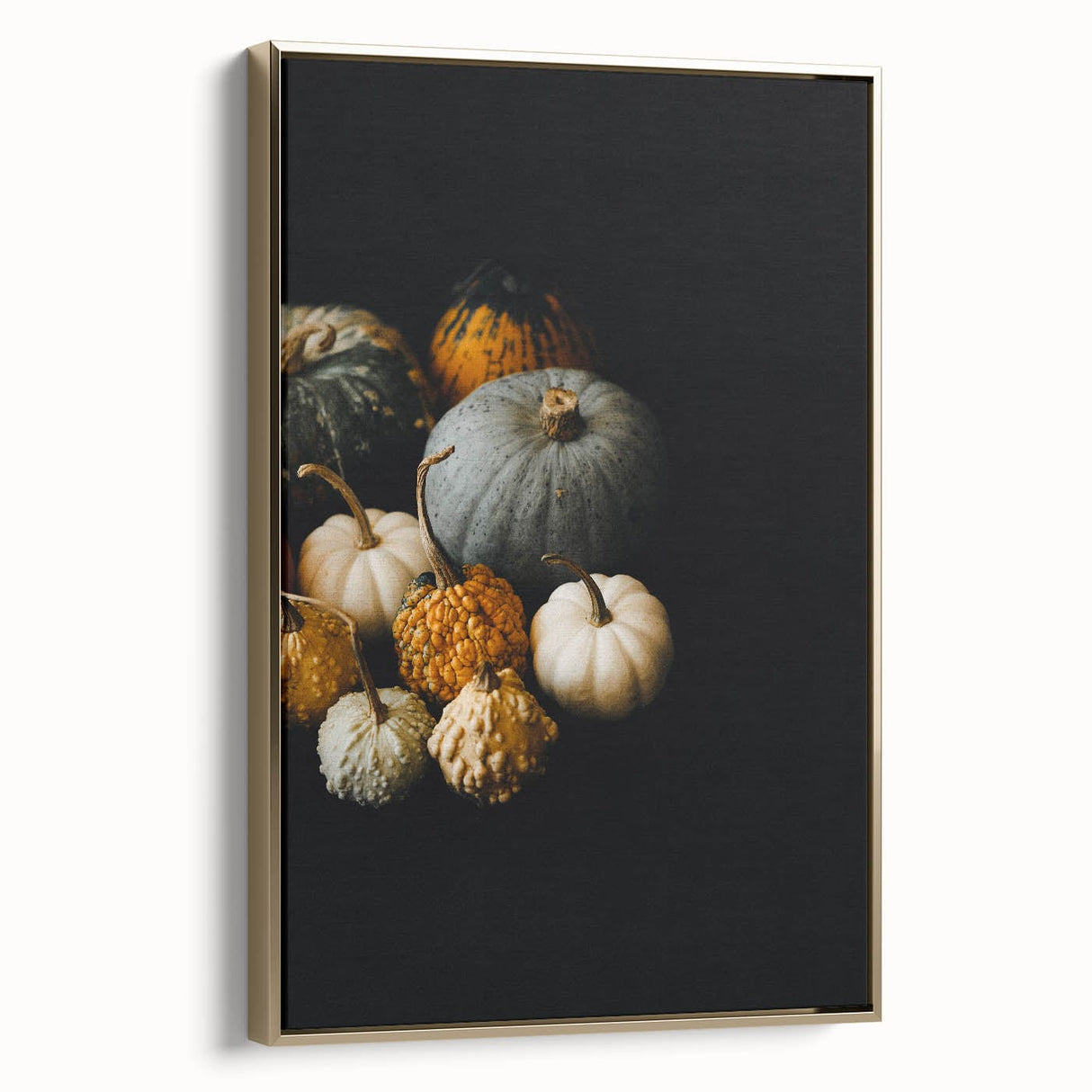 Framed canvas depicting a vintage landscape scene with autumnal trees in golden and black tones.