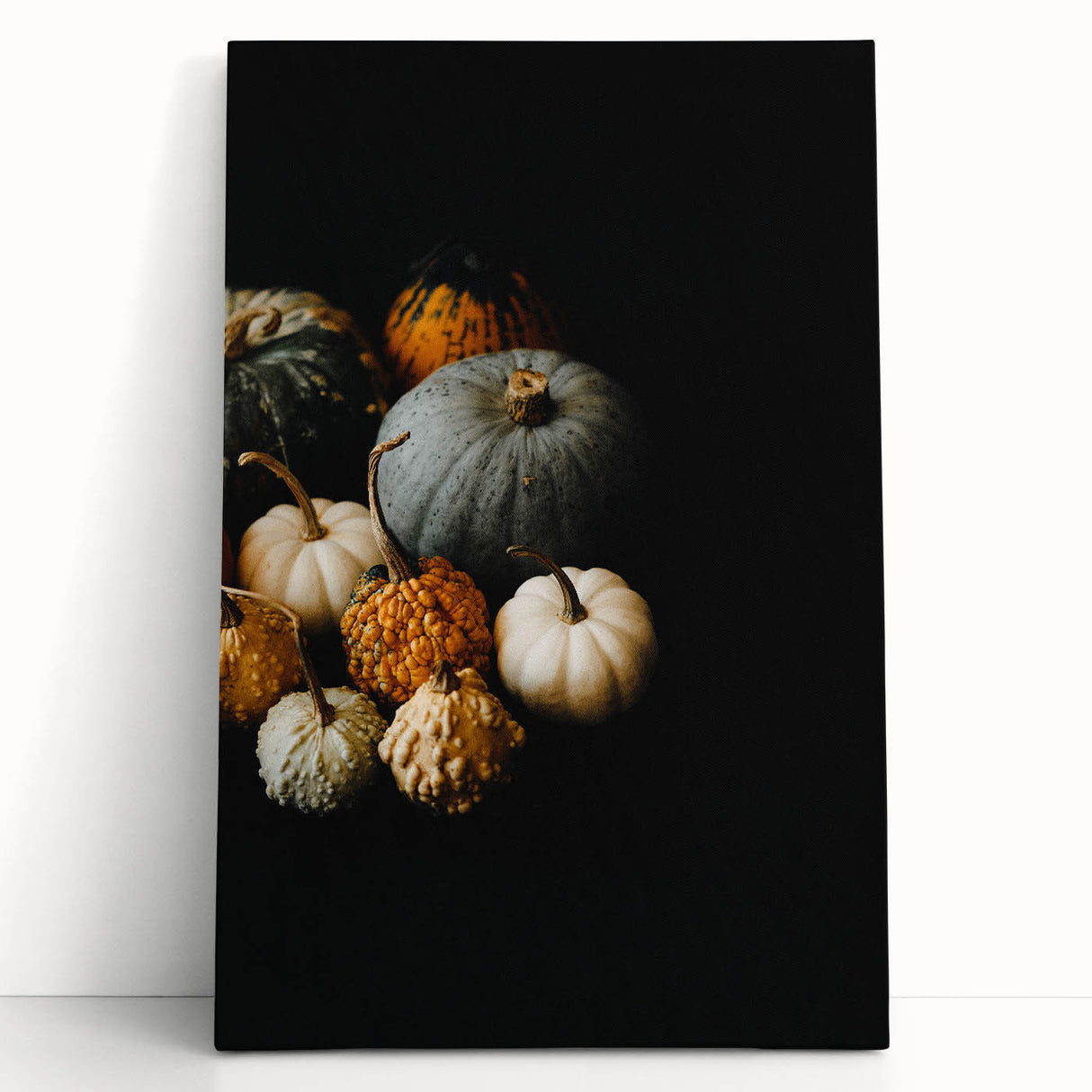Large black and white abstract depiction of fall trees on stretched canvas.